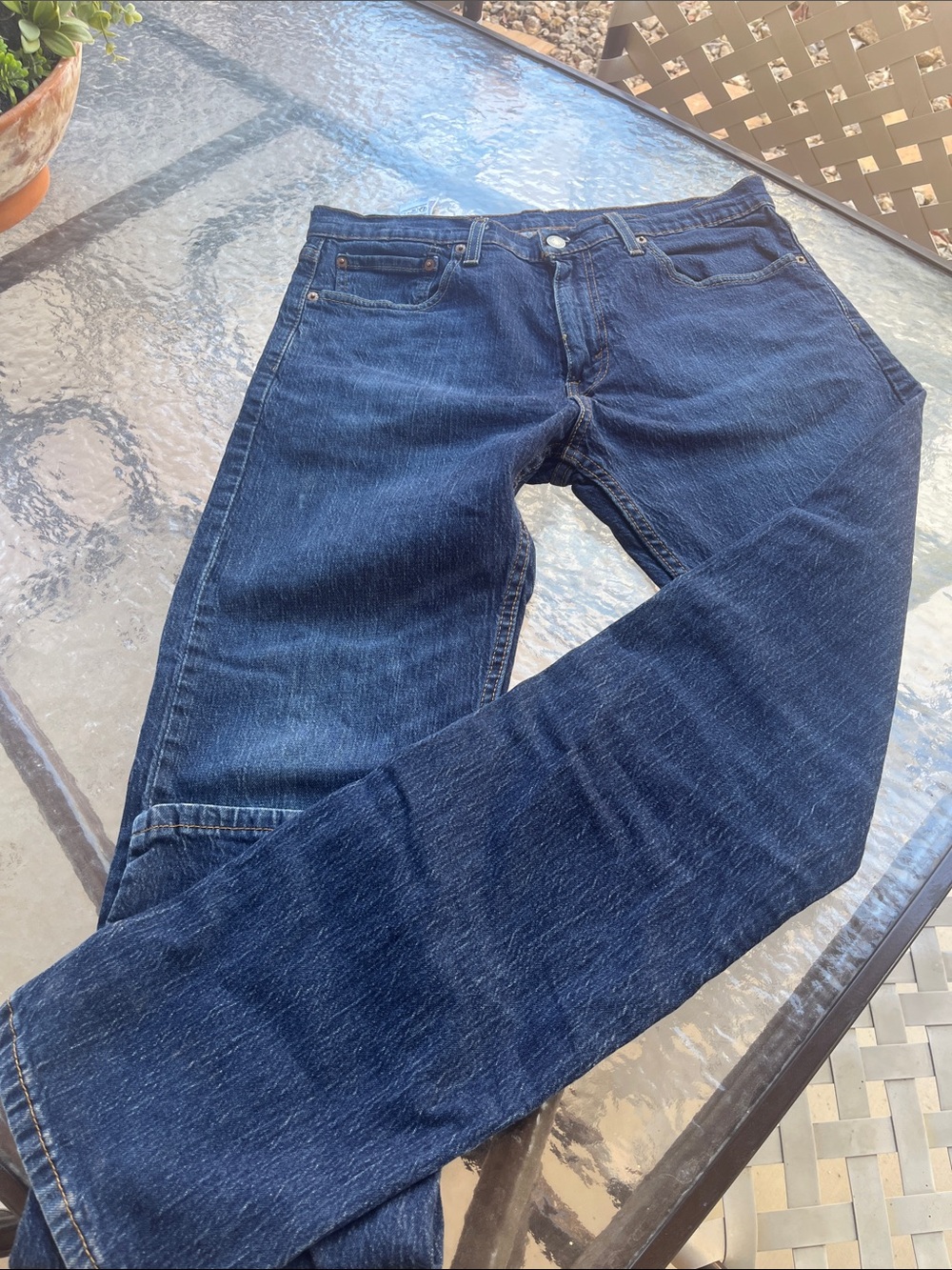 Levi's 505 Jeans in Dark Blue with Tan Patch. 32x32